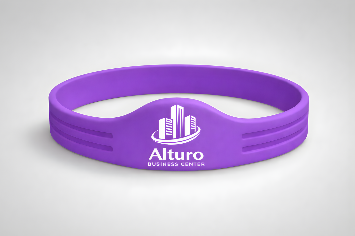 A purple silicone wristband with NFC and custom logo from JM Band®